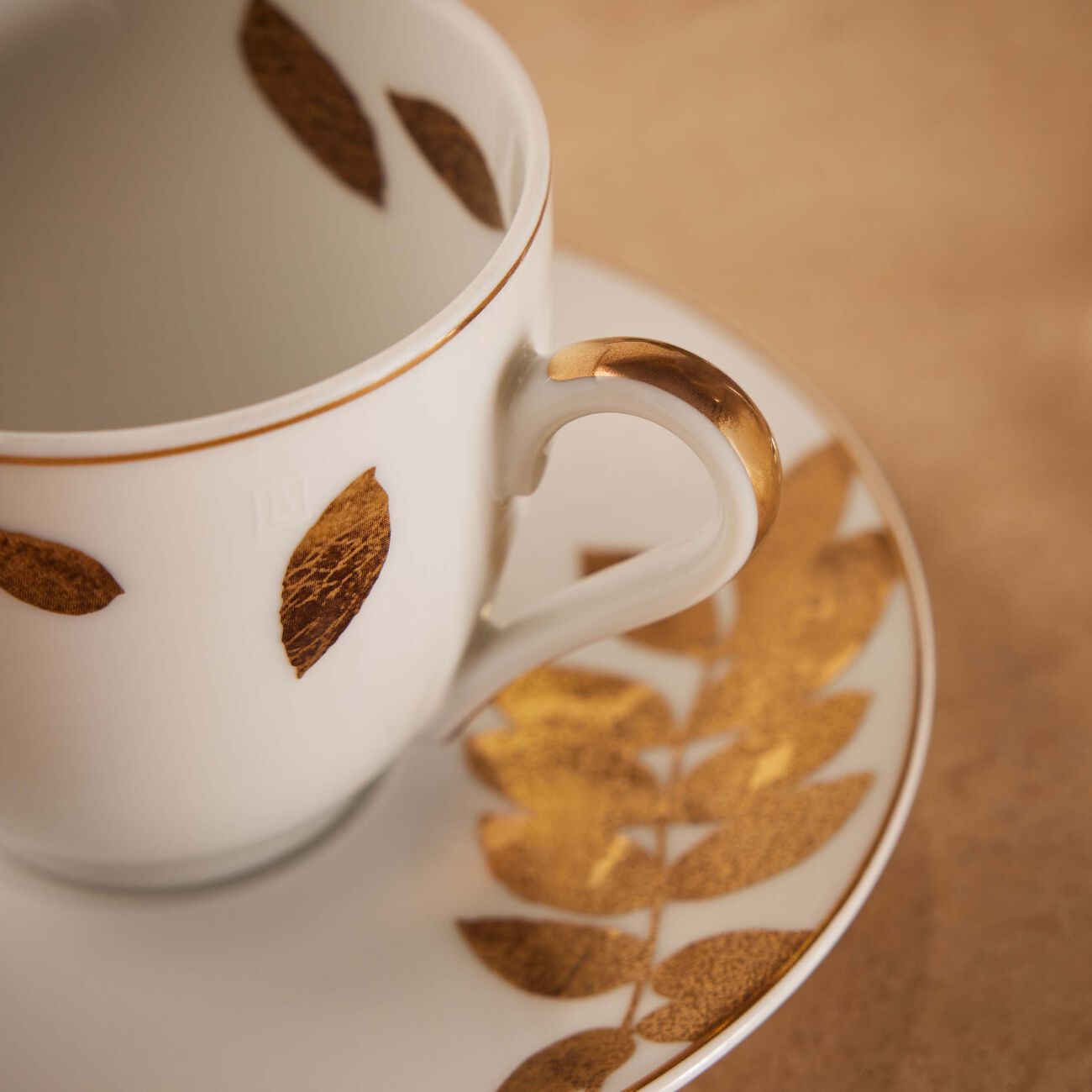bernardaud vegetal or coffee cup saucer gold
