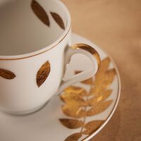 bernardaud vegetal or coffee cup saucer gold