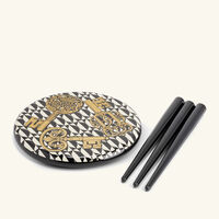 fornasetti chiavi e losanghe stool pattern